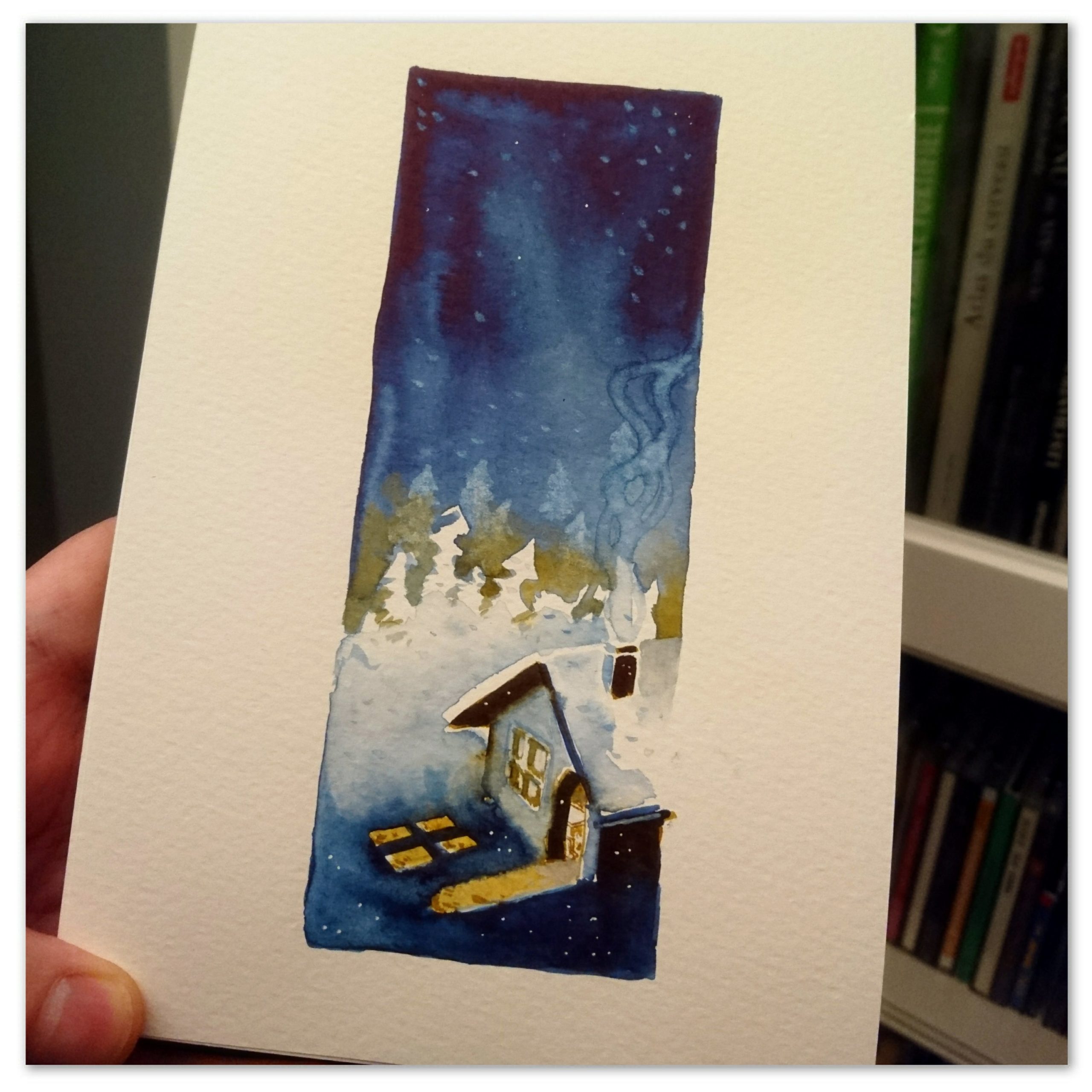 Petite aquarelle de l'hiver Peinture représentant une maison sous la neige en pleine nuit avec les lumières de l'intérieur qui se projettent à l'extérieur.